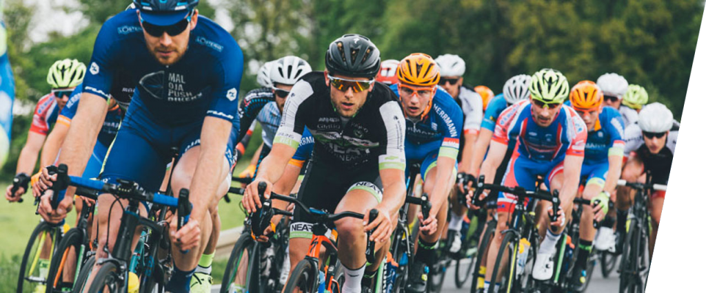 A large group of cyclists engaged in a road race